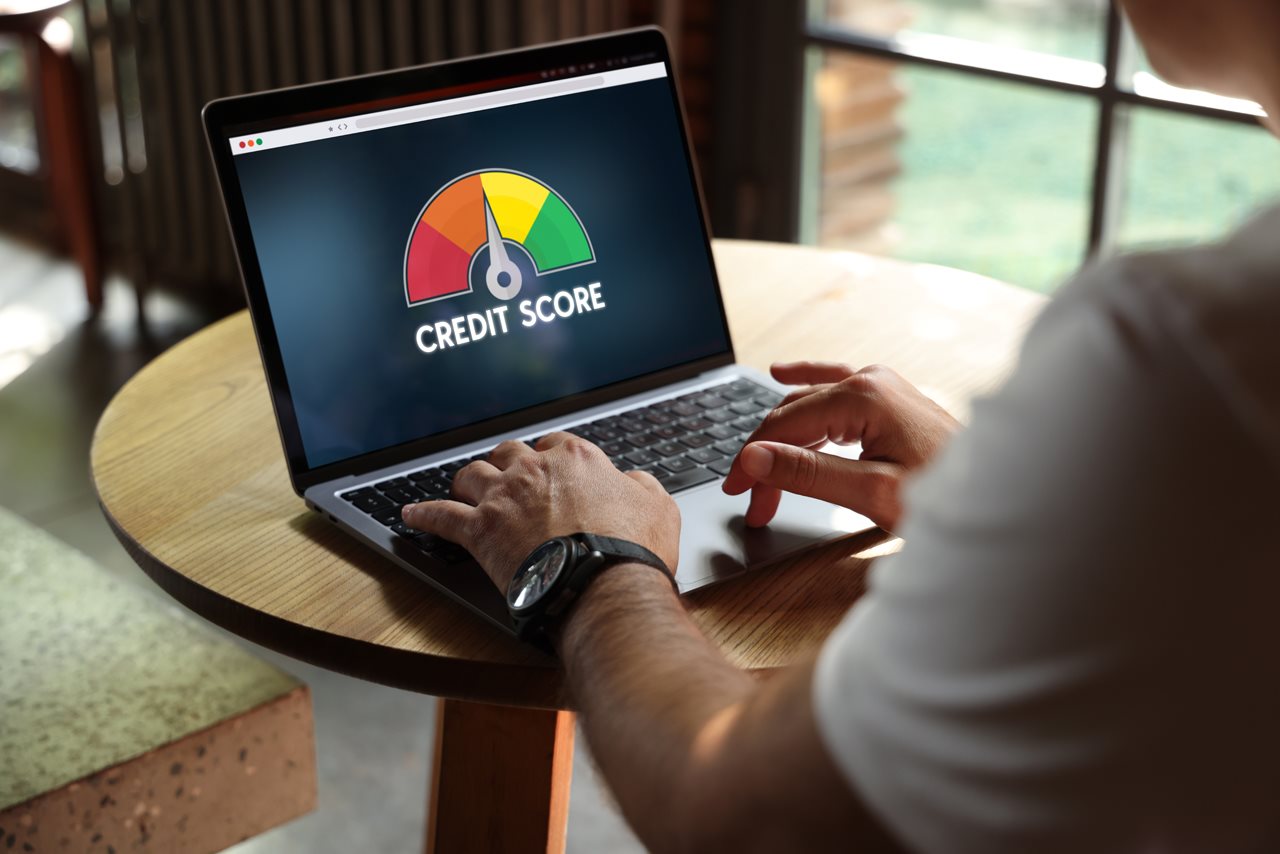 Man checking his credit score online.