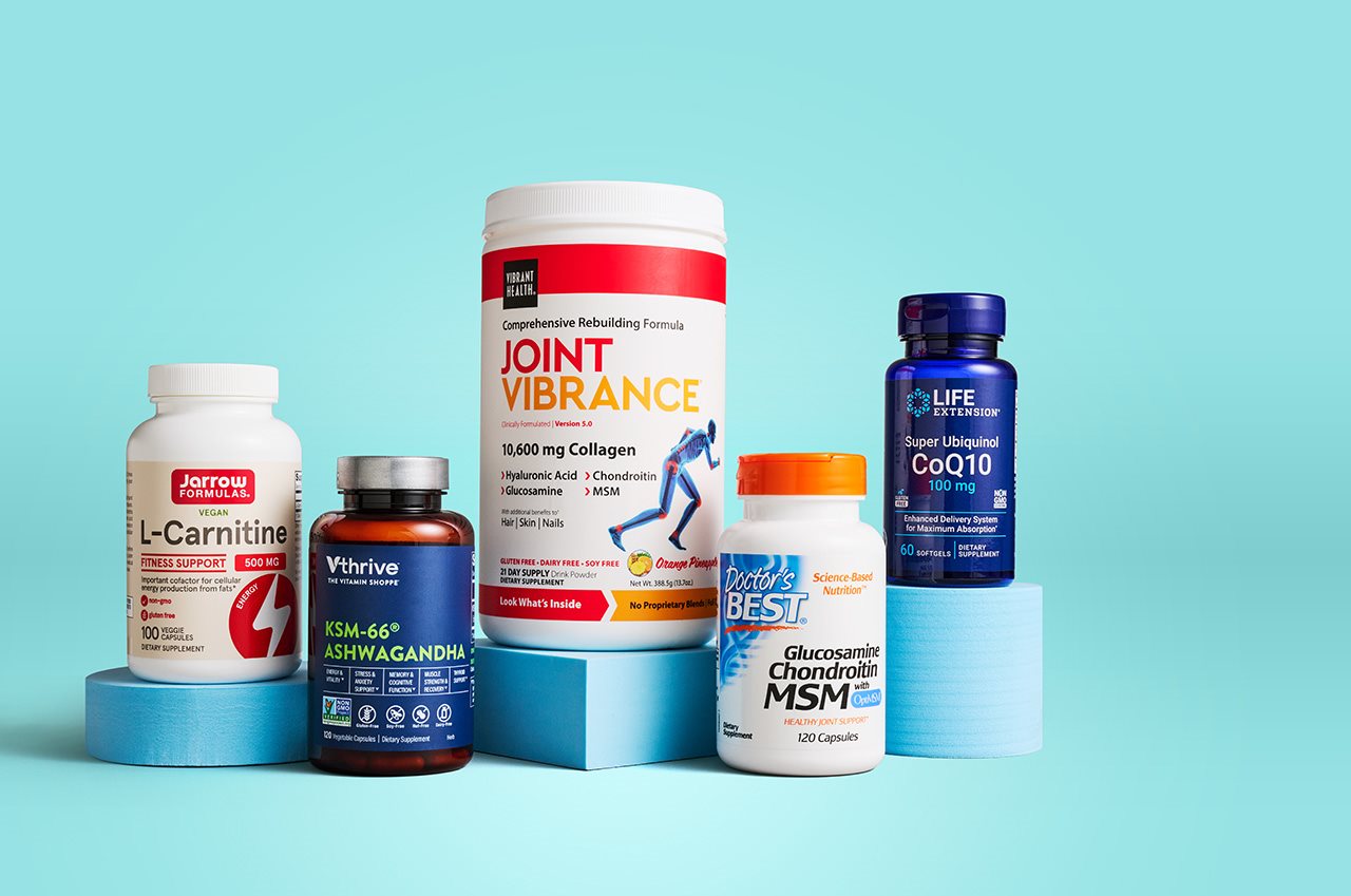 Variety of supplements against a light blue backdrop