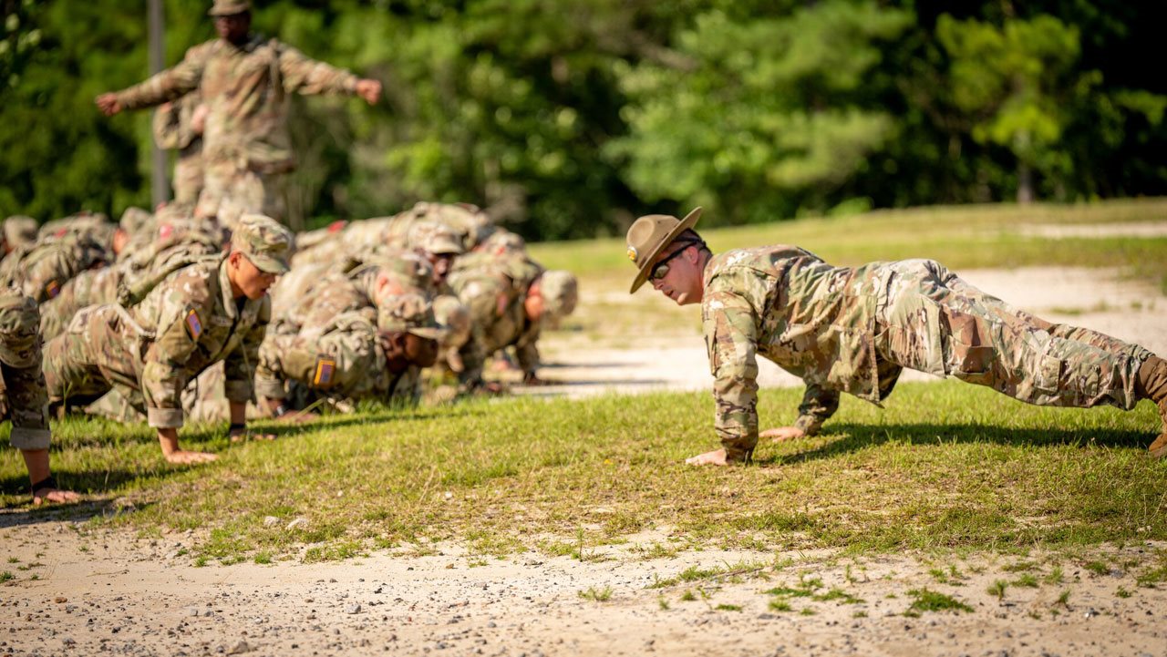 Group of individules involved with the Soldier Preparatory Course getting physical training to be an Army Soldier.