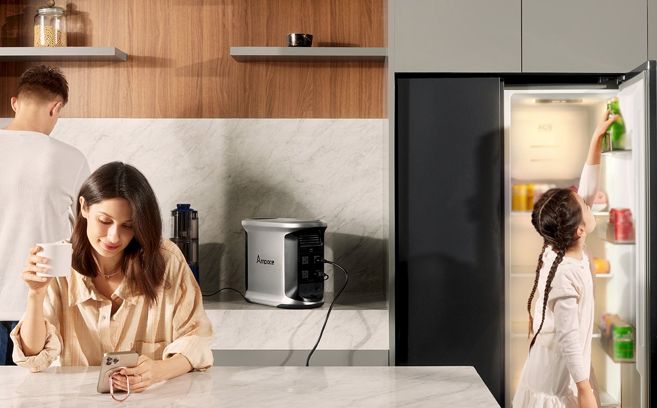 Parents drinking coffee and little girl in the refridgerator while using Ampace device.