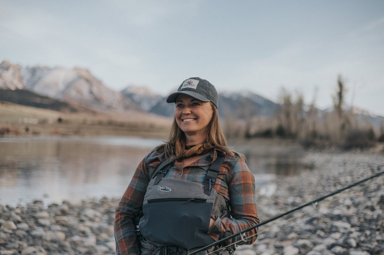 Lindsay in gear fishing from shore.