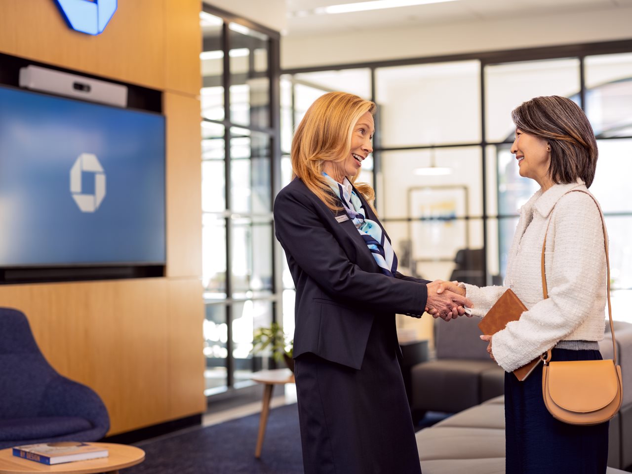 Woman talking with a banker in a bank