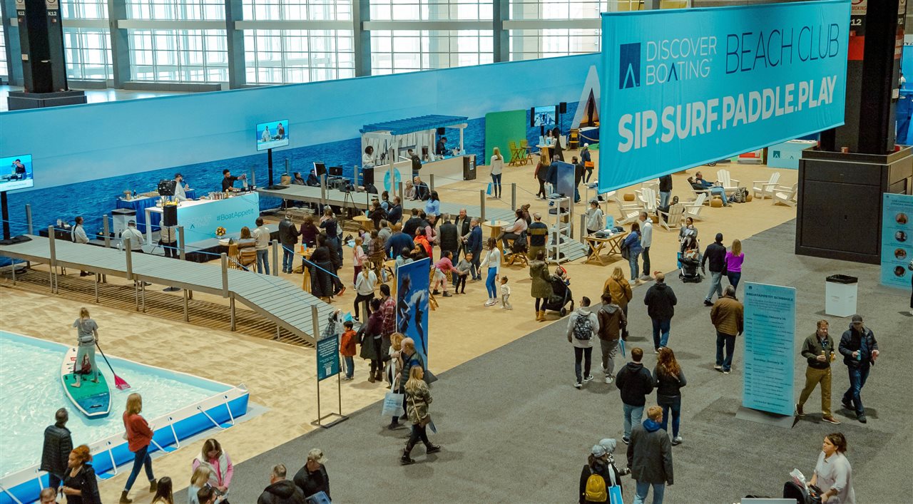 People partaking of activites offered at the boat show.