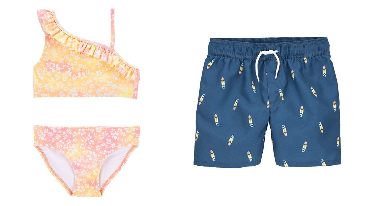 Two-piece ruffles bathing suit and surfboard print swim shorts