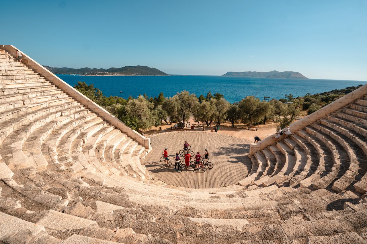 Cyclists on the Dalmatian Coast pause to experience the breathtaking beauty of this historic vista.