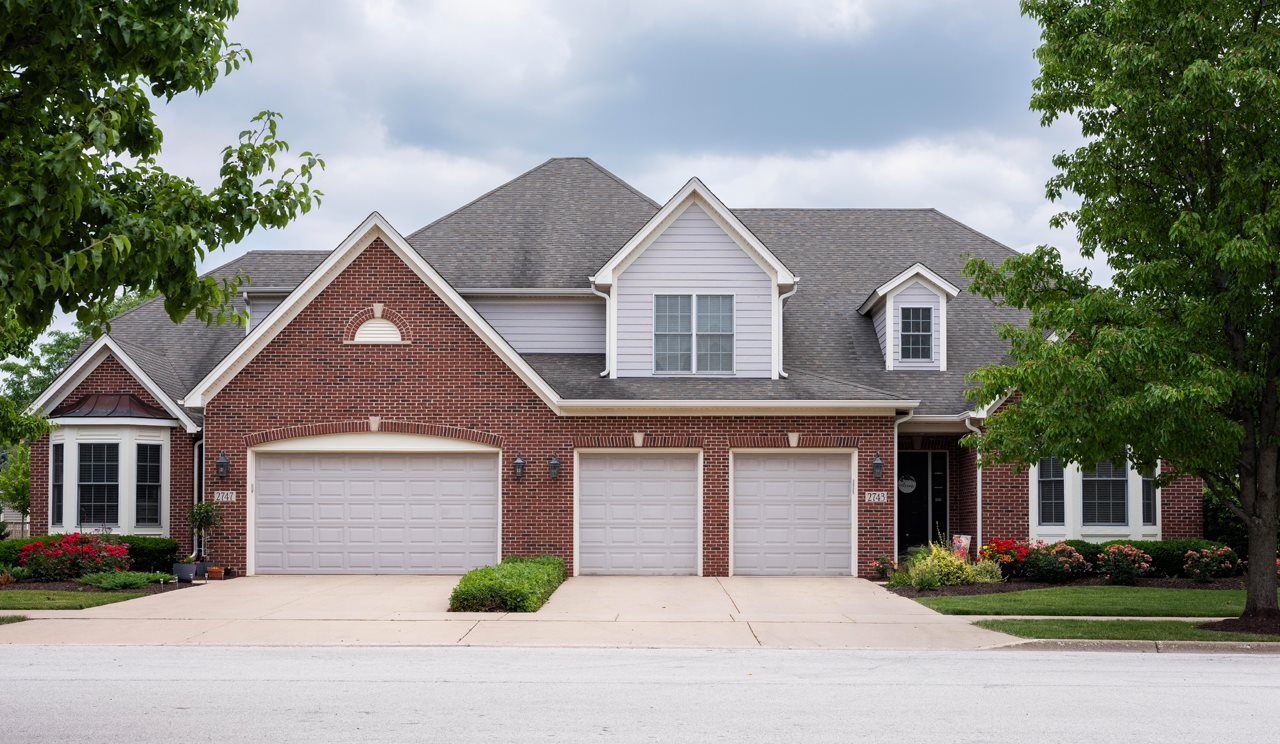 Brick duplex in a neighborhood.