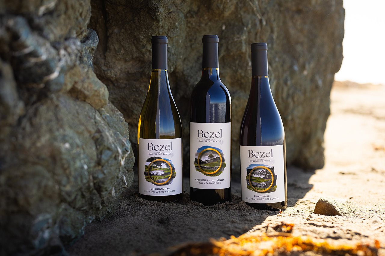 Three bottles of wine on the beach