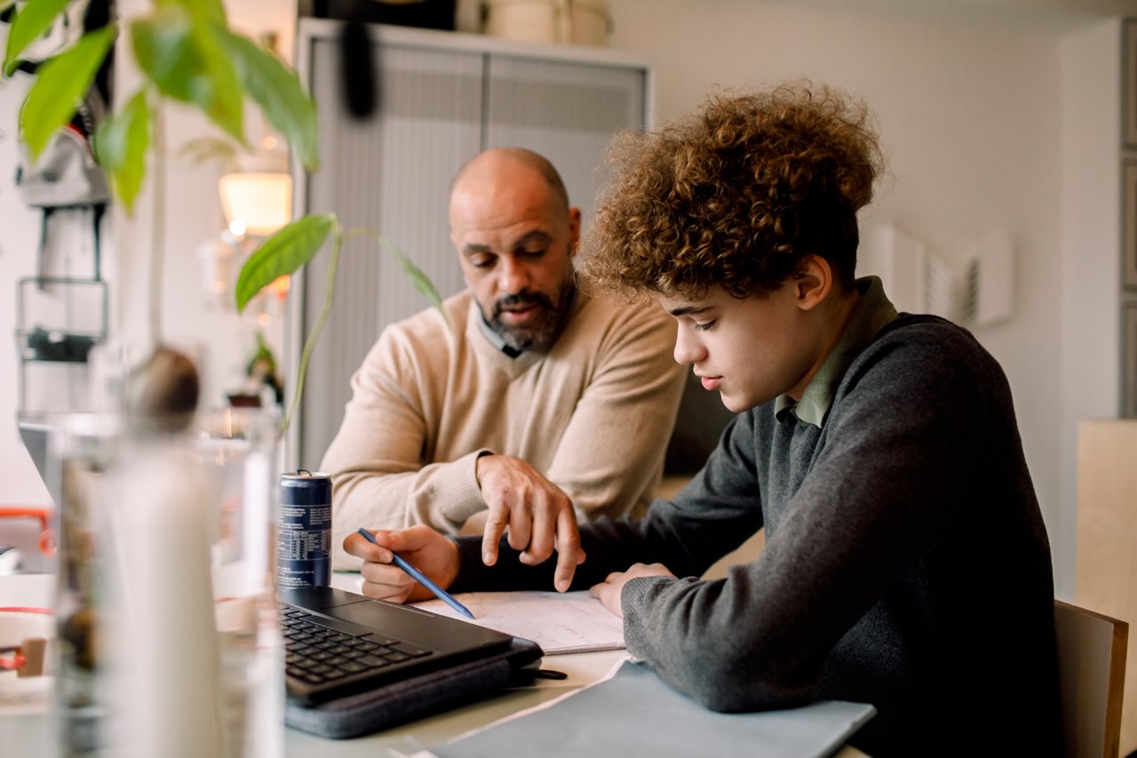 Dad and son narrowing down the list of potencial colleges.